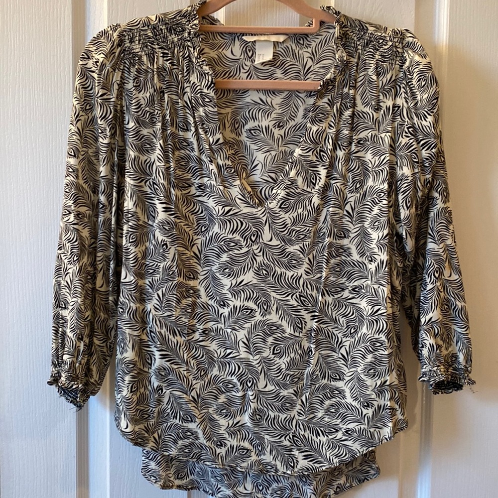 Monochrome blouse with ruffle details